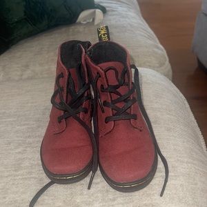 Maroon combat boots. Lots of wear left in them.